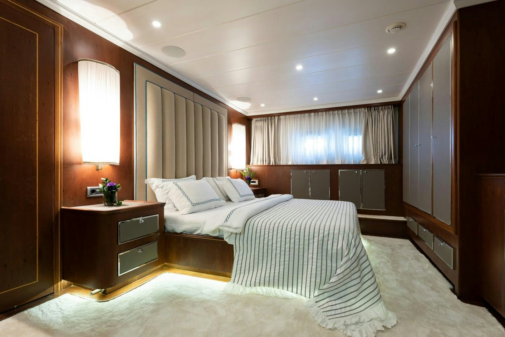 a room with two beds aboard OCEAN BREEZE Yacht for Sale