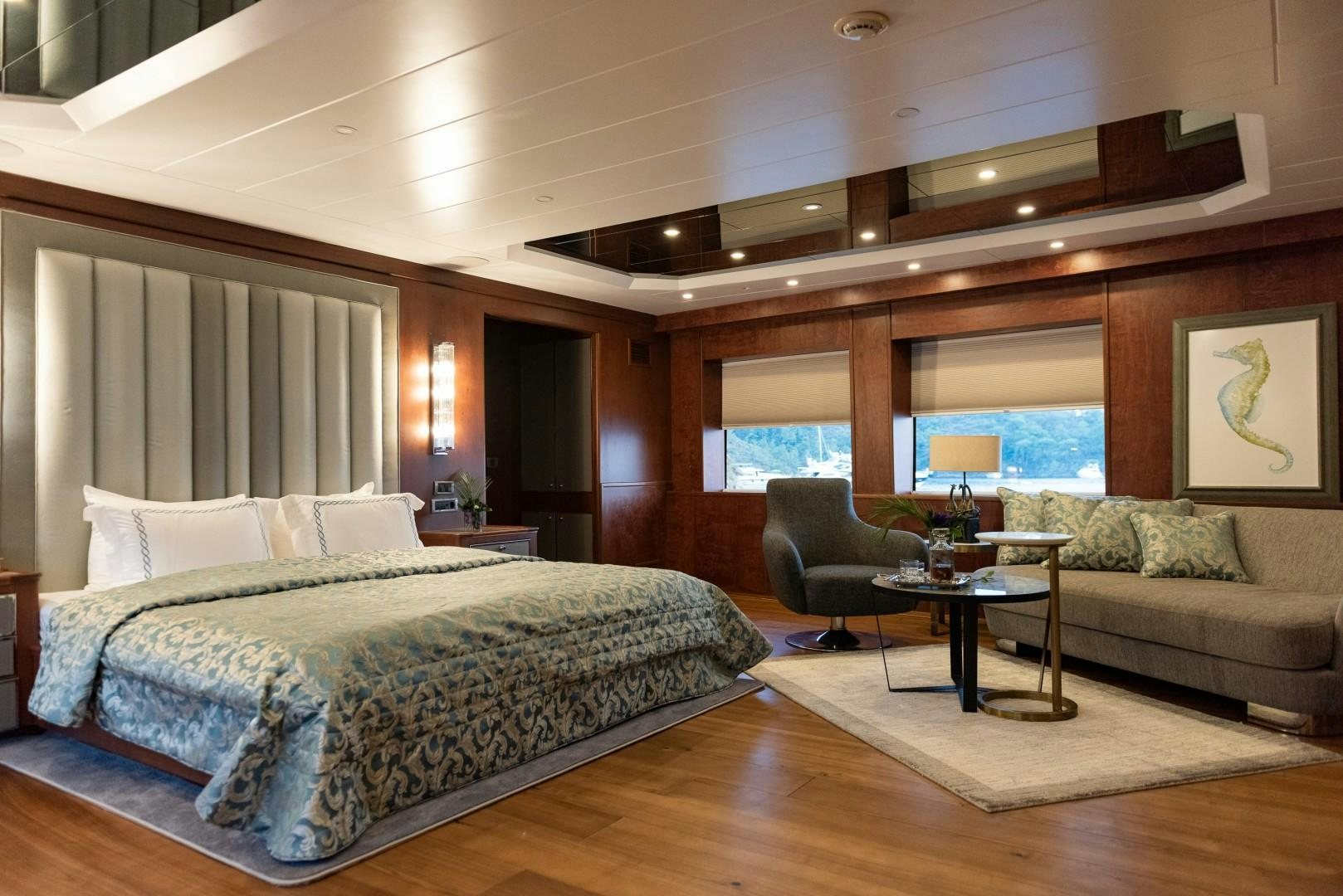 a large bedroom with a large bed aboard OCEAN BREEZE Yacht for Sale
