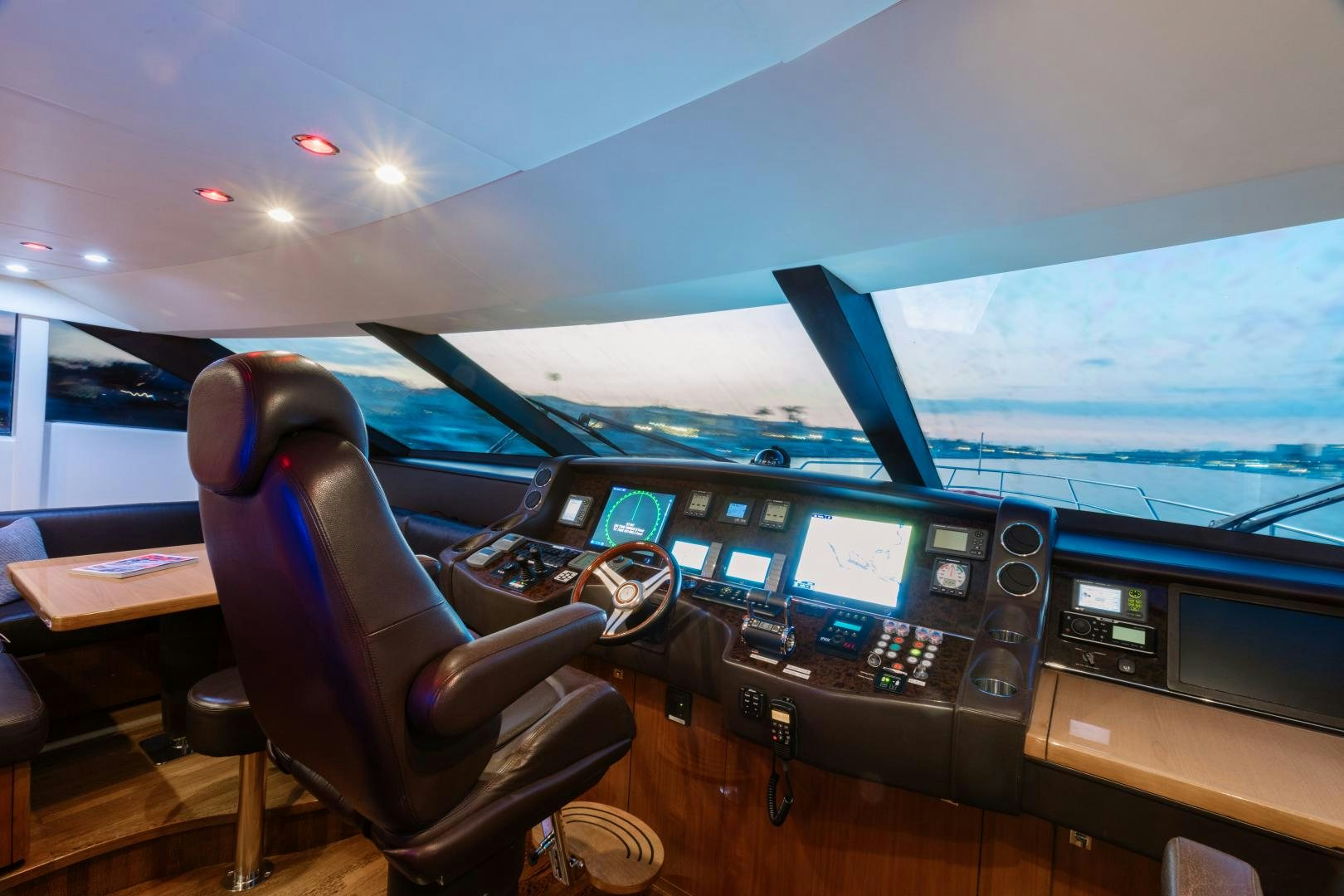 a room with a desk and chairs aboard LOVE N LIFE Yacht for Sale