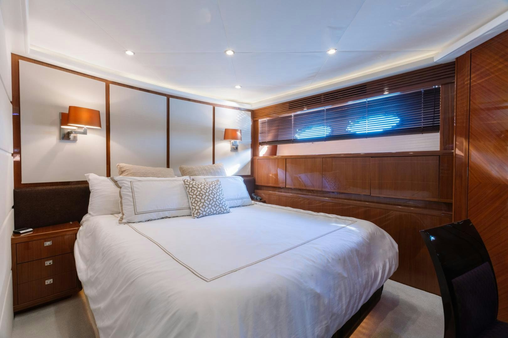 a room with a bed and a television aboard LOVE N LIFE Yacht for Sale