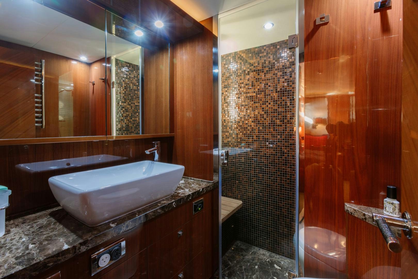 a bathroom with a sink and shower aboard LOVE N LIFE Yacht for Sale