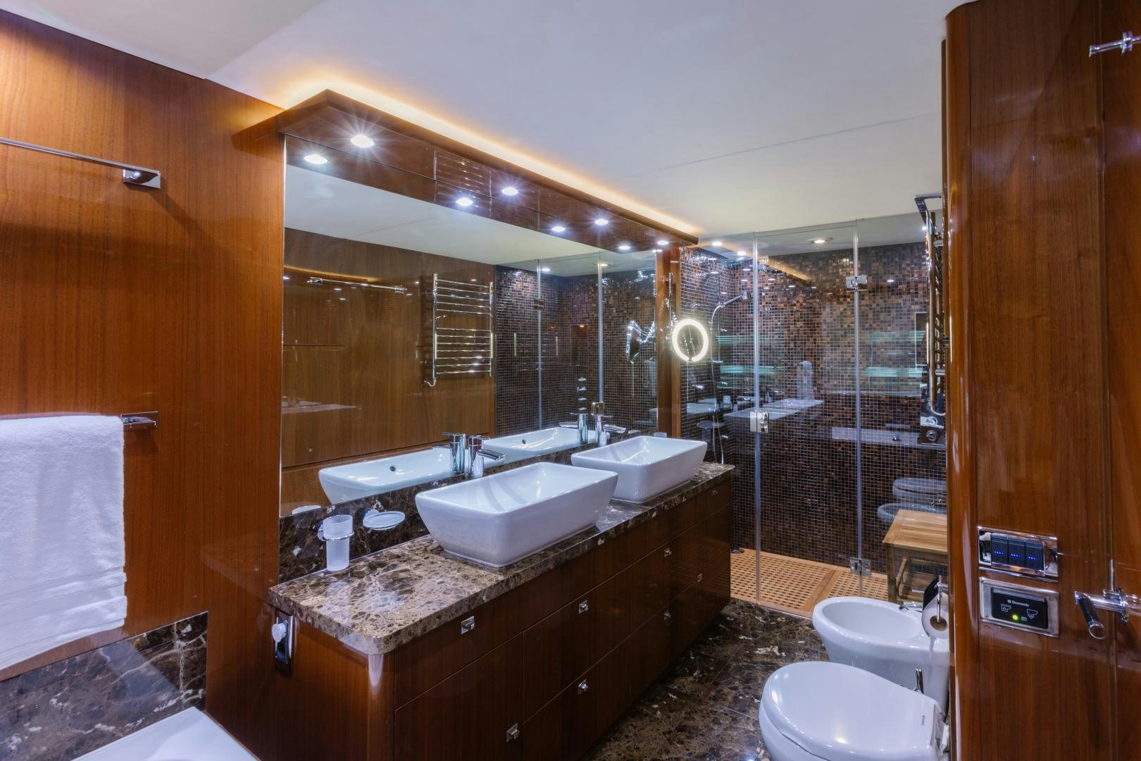 a bathroom with a large mirror aboard LOVE N LIFE Yacht for Sale