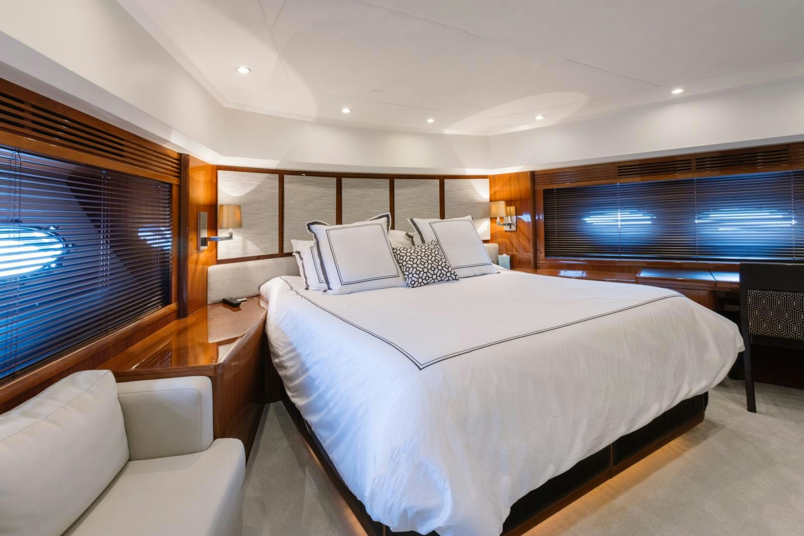 a hotel room with a large bed aboard LOVE N LIFE Yacht for Sale