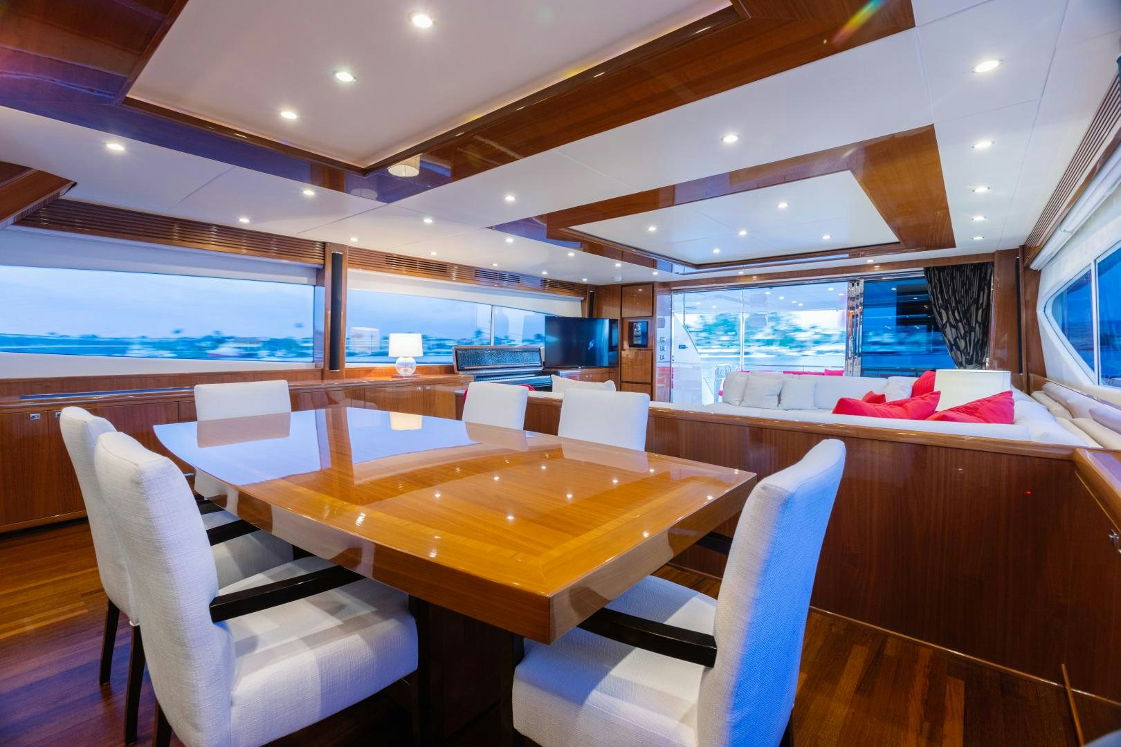 a room with a table and chairs aboard LOVE N LIFE Yacht for Sale