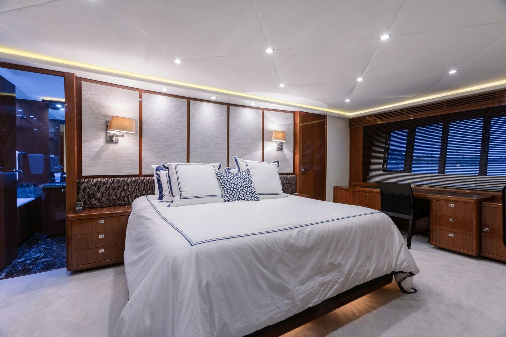 a large bedroom with a large bed aboard LOVE N LIFE Yacht for Sale