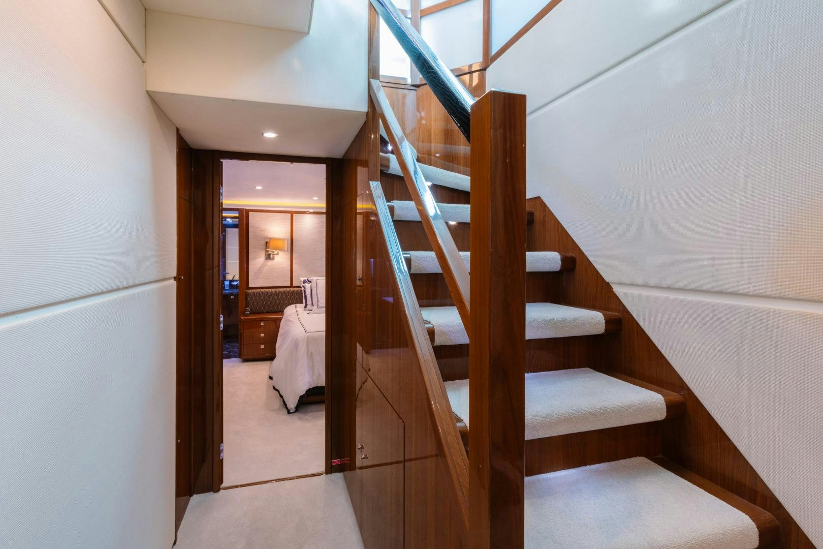 a wooden staircase in a room aboard LOVE N LIFE Yacht for Sale