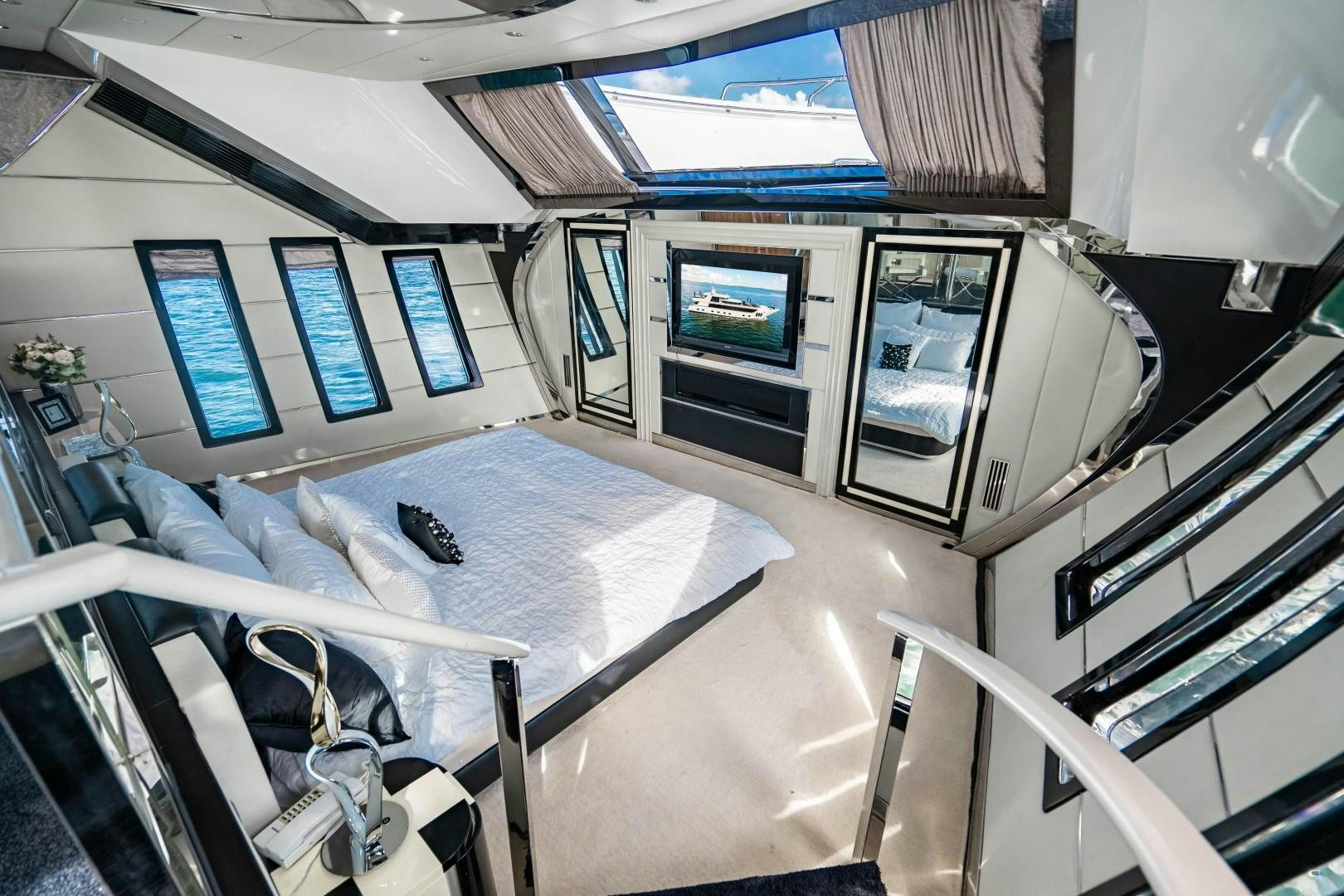 a hospital room with a bed and a television aboard PRIVILEGE Yacht for Sale