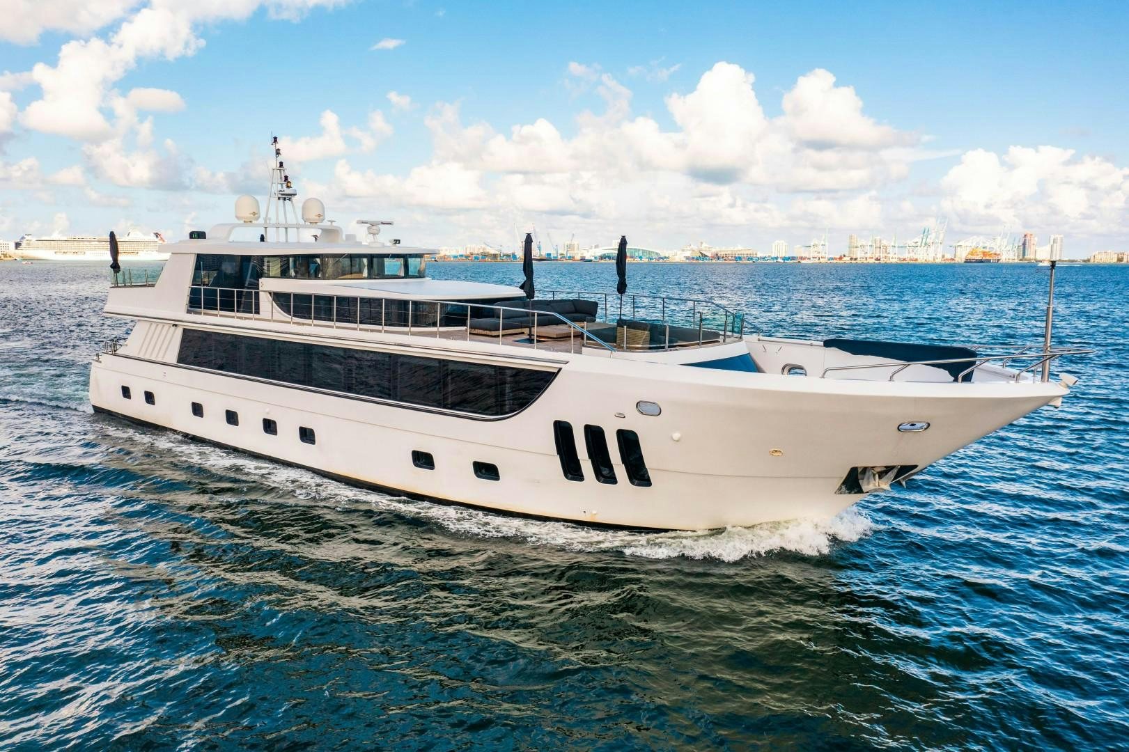 a large white boat in the water aboard PRIVILEGE Yacht for Sale