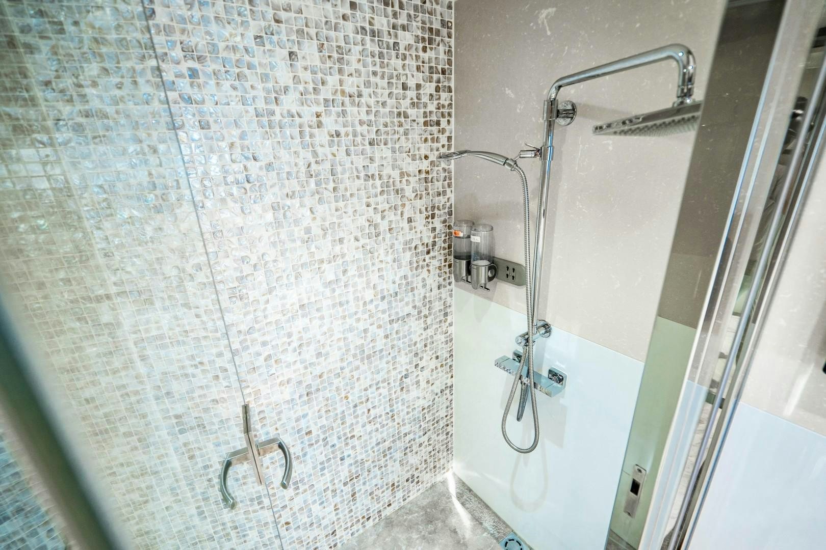 a shower with a glass door aboard PRIVILEGE Yacht for Sale