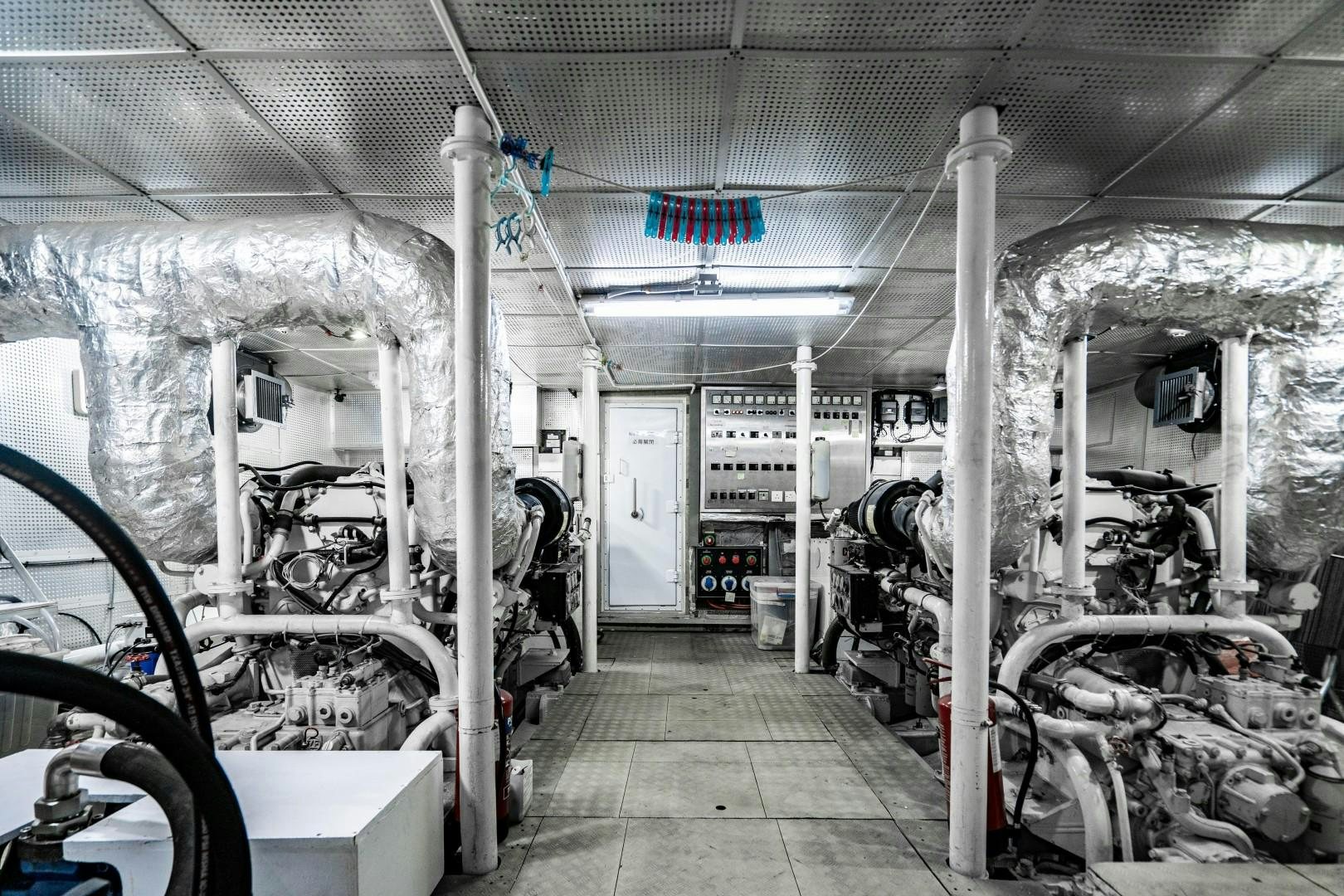 a room with machinery aboard PRIVILEGE Yacht for Sale