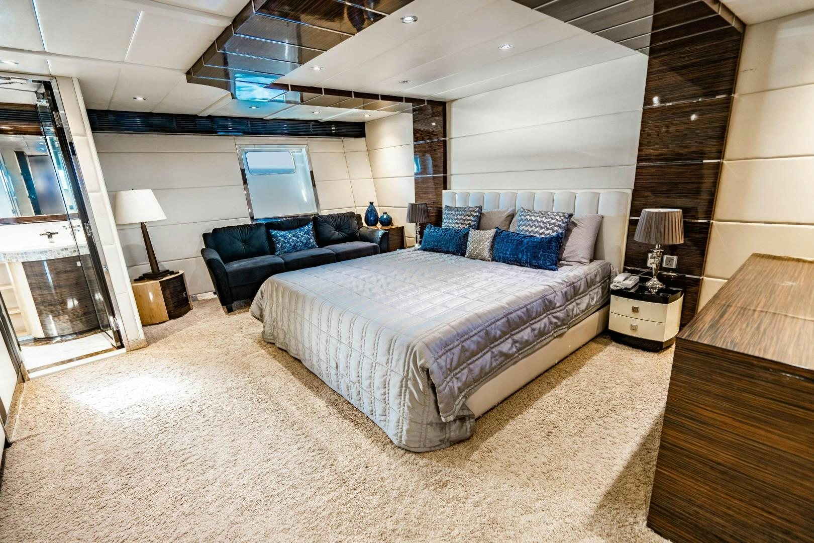 a large bed in a room aboard PRIVILEGE Yacht for Sale
