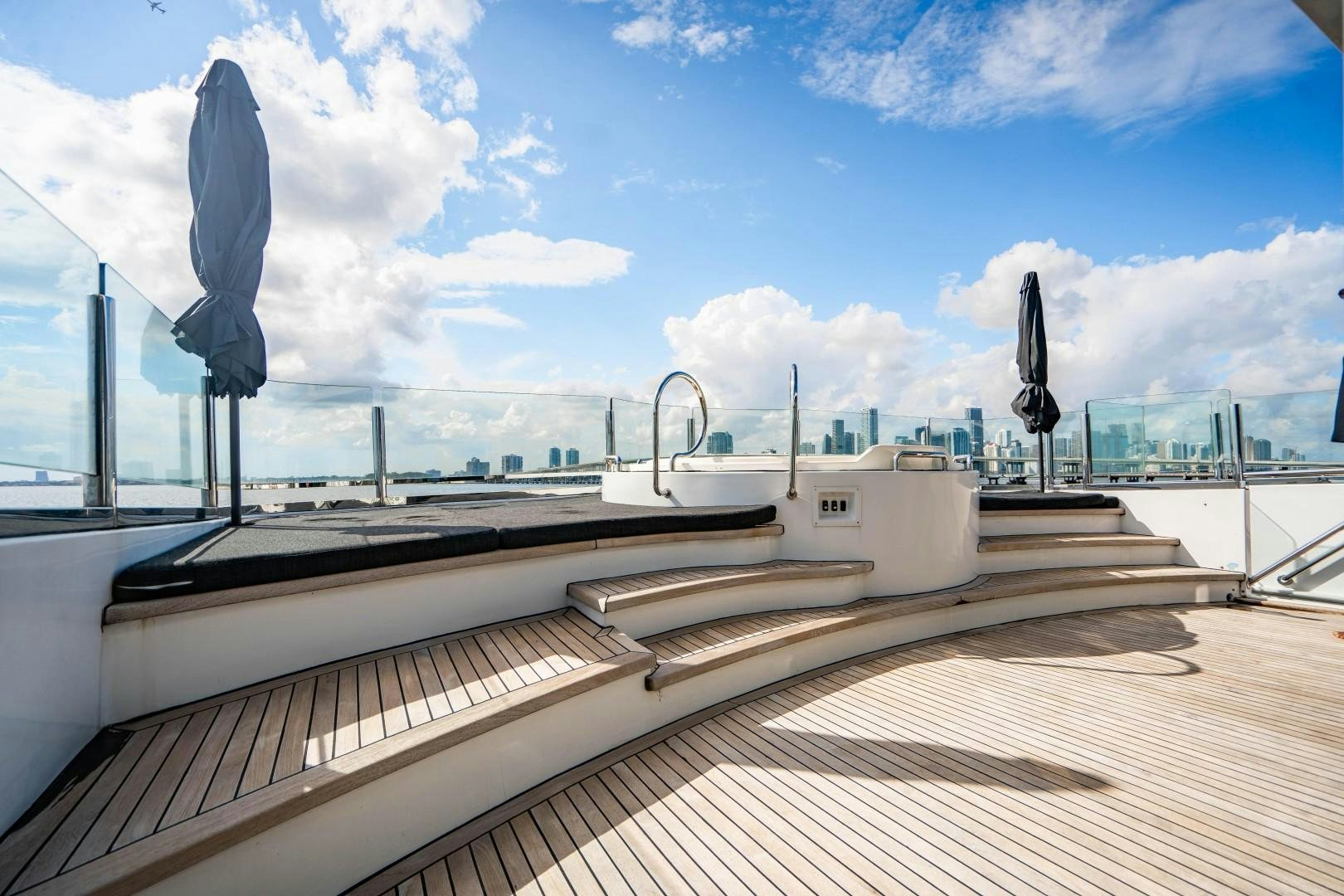 a large white boat on a body of water aboard PRIVILEGE Yacht for Sale