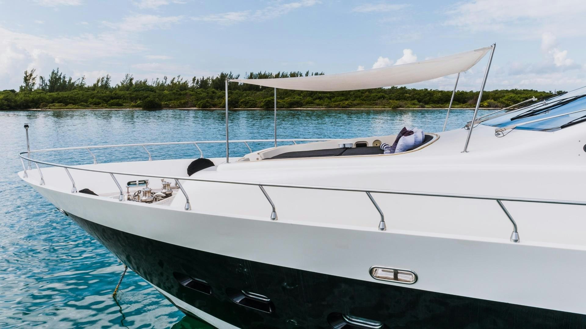 a white boat on the water aboard CASSINELLA Yacht for Sale