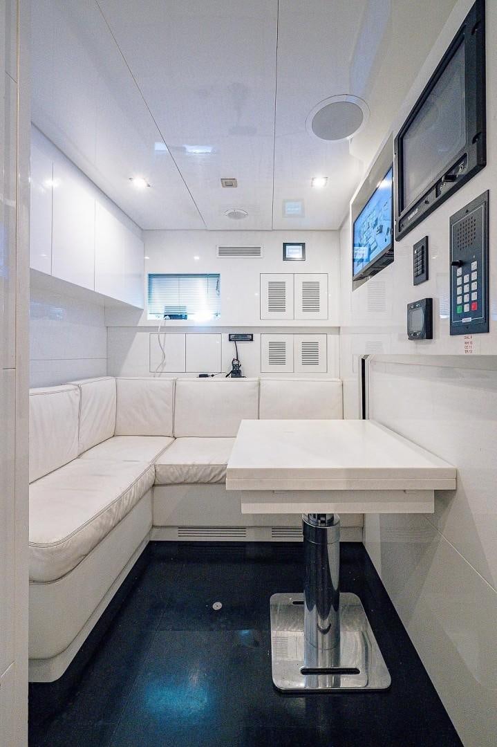 a bathroom with a large mirror aboard CASSINELLA Yacht for Sale