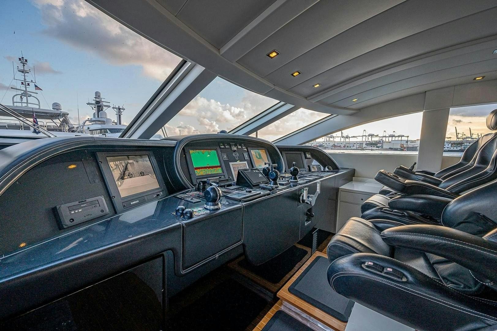 inside of a car aboard CASSINELLA Yacht for Sale