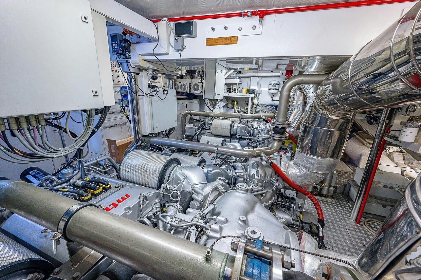 a close-up of a car engine aboard CASSINELLA Yacht for Sale
