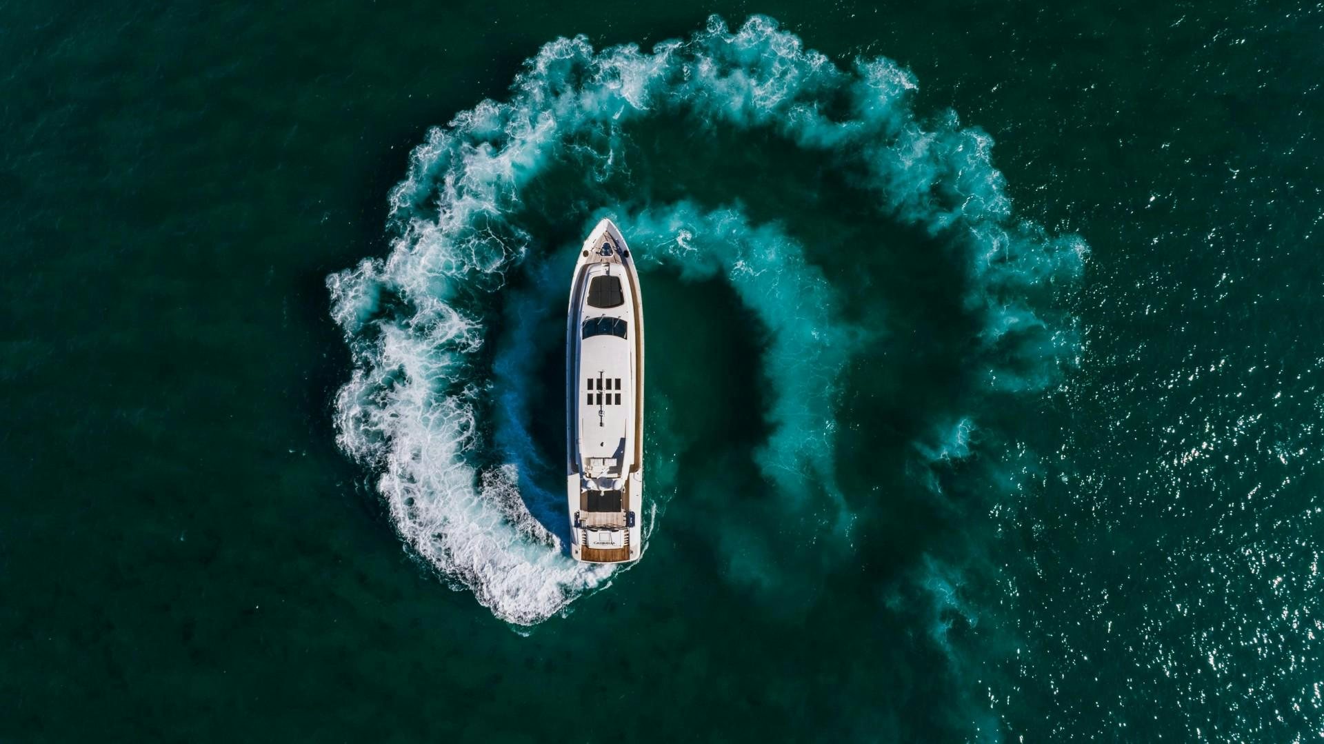 a white and black boat in the water aboard CASSINELLA Yacht for Sale