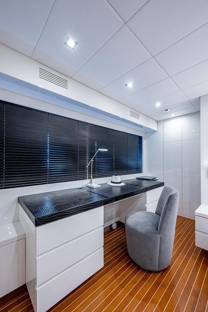 a kitchen with a large window aboard CASSINELLA Yacht for Sale