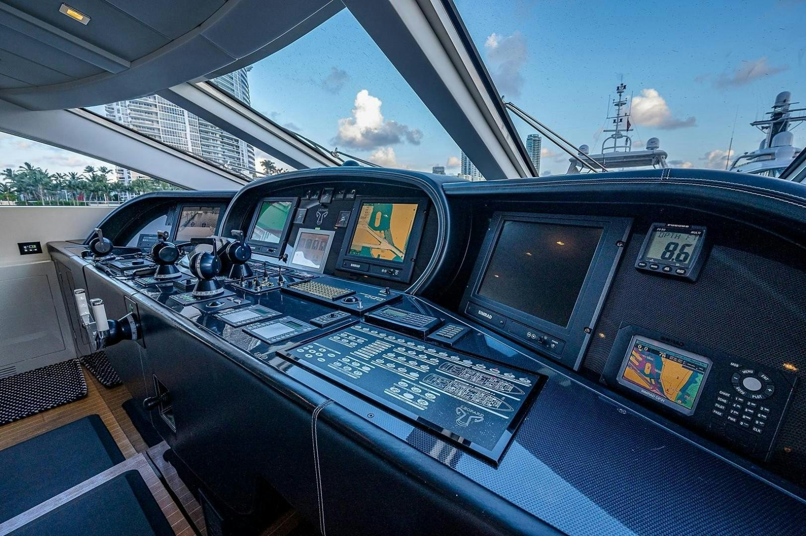 inside of a car aboard CASSINELLA Yacht for Sale