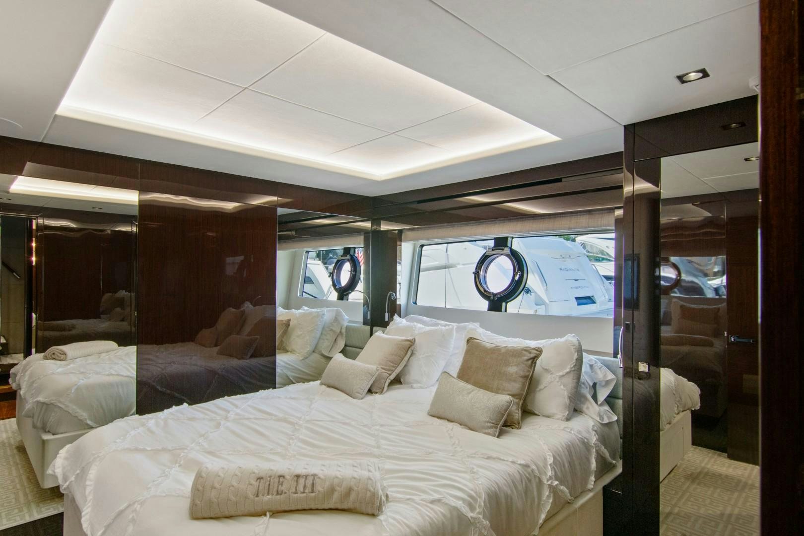 a bed in a room aboard GOLDEN OURS Yacht for Sale