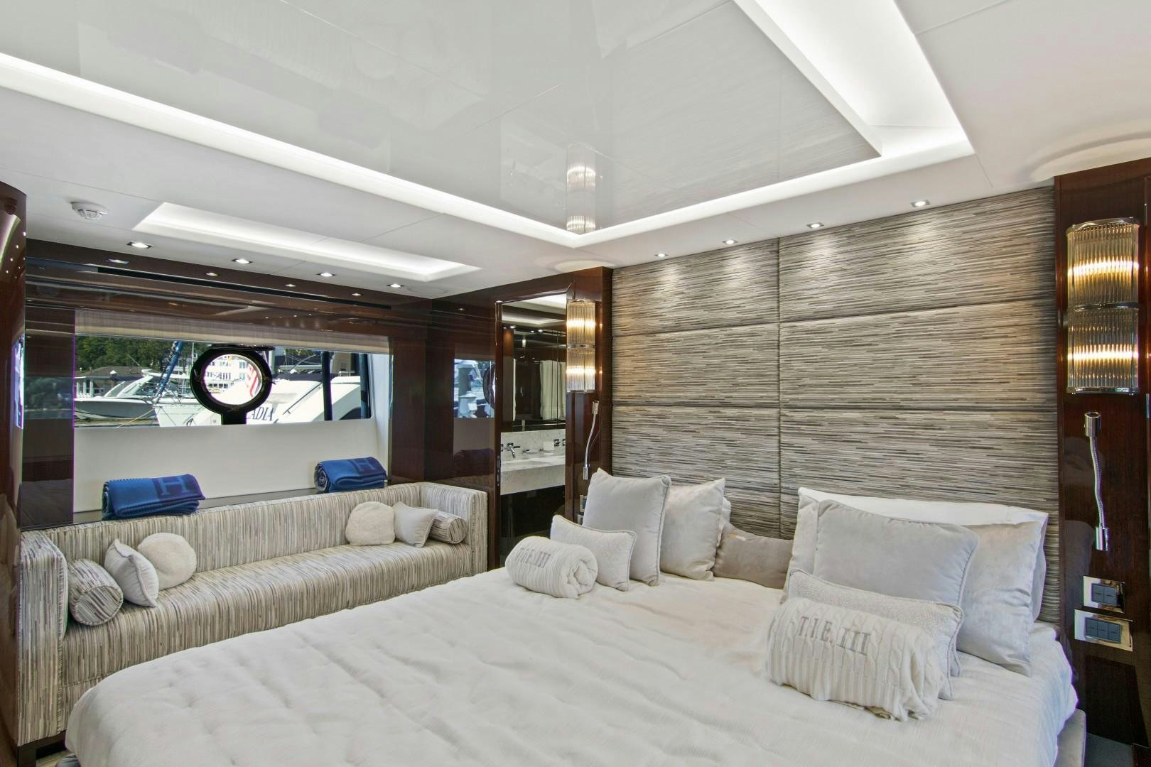 a large bed in a room aboard GOLDEN OURS Yacht for Sale
