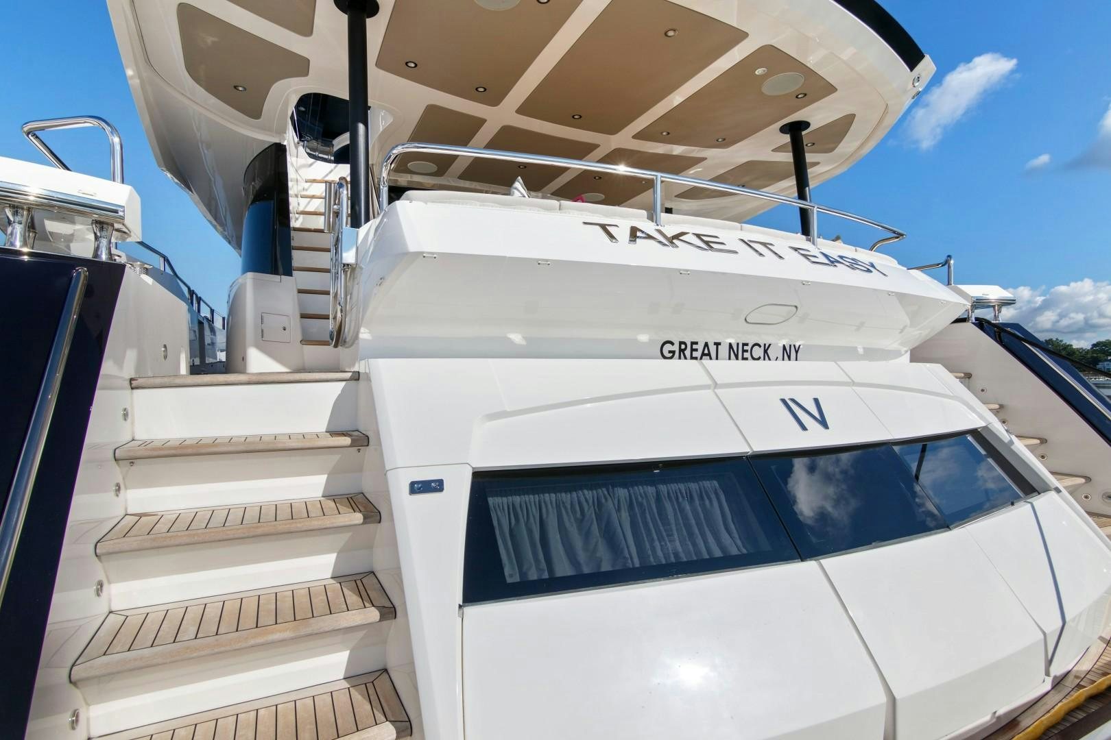 a white boat on a boat aboard GOLDEN OURS Yacht for Sale