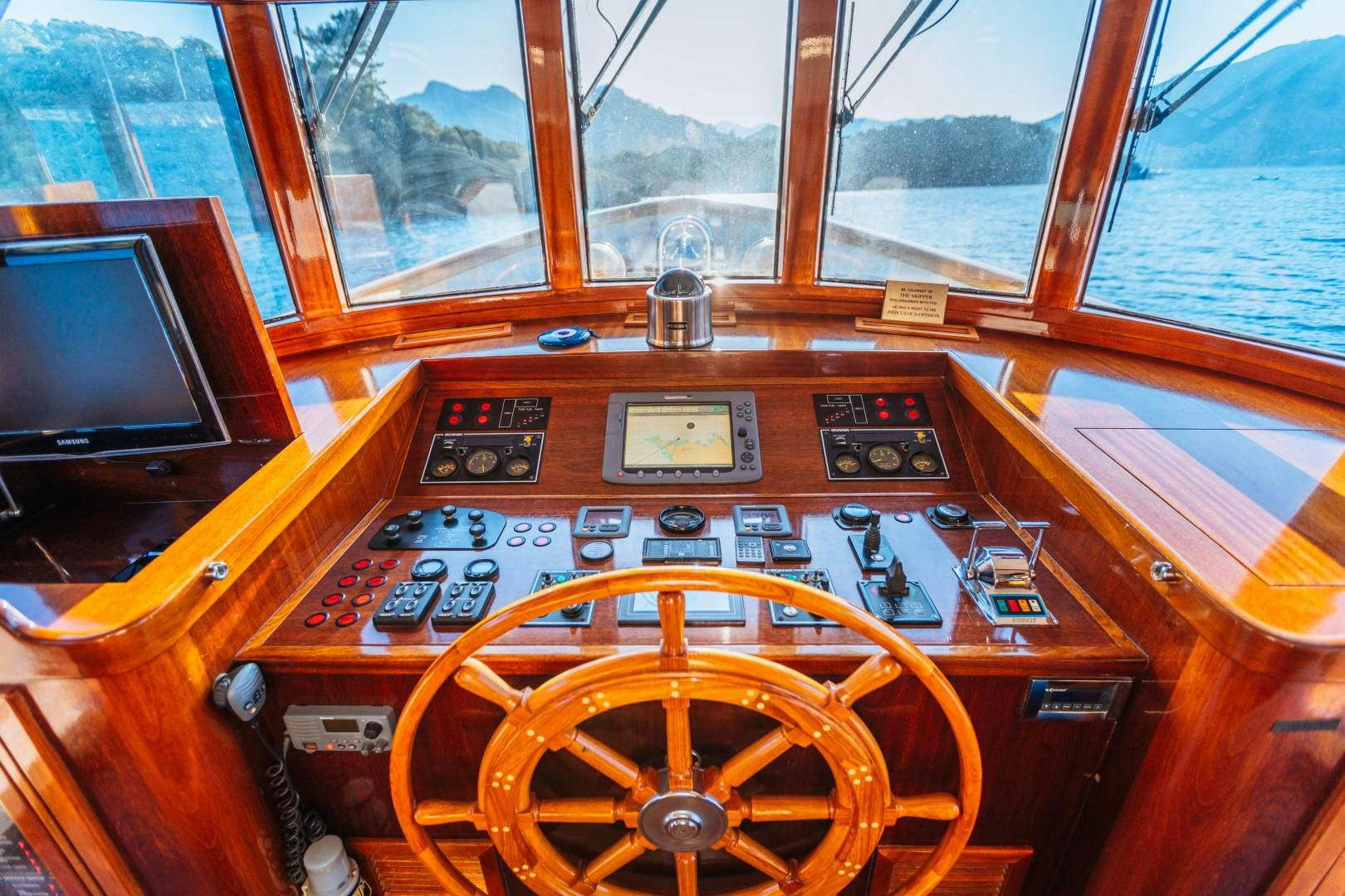 a wooden radio on a table aboard LARIMAR Yacht for Sale