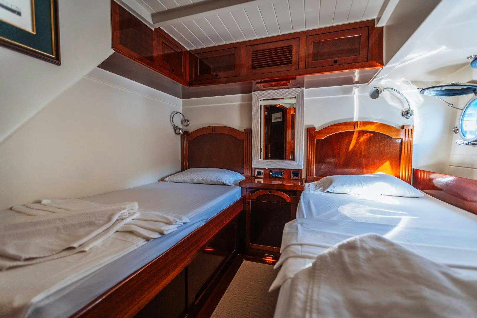 a couple of beds in a room aboard LARIMAR Yacht for Sale