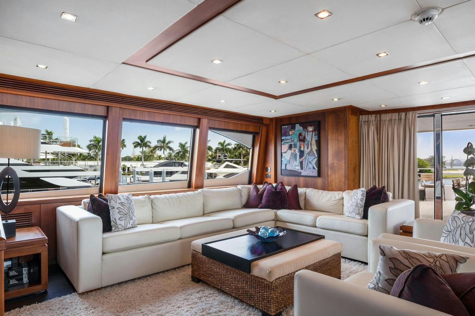 a living room with a large window aboard ACACIA Yacht for Sale