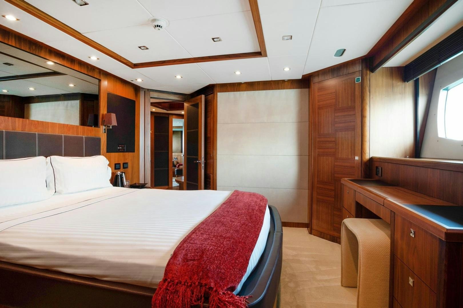 a bed in a room aboard ACACIA Yacht for Sale