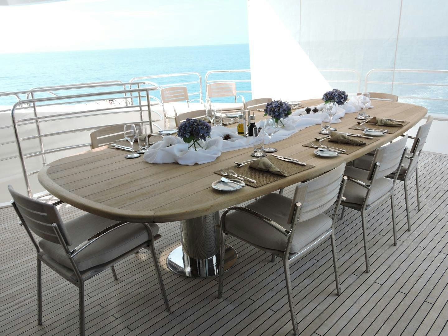 a table set for a dinner aboard ACACIA Yacht for Sale