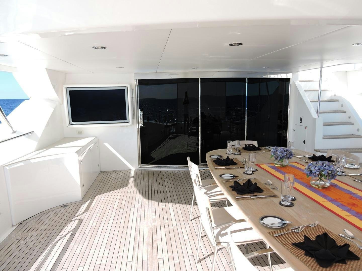 a room with a table and chairs aboard ACACIA Yacht for Sale