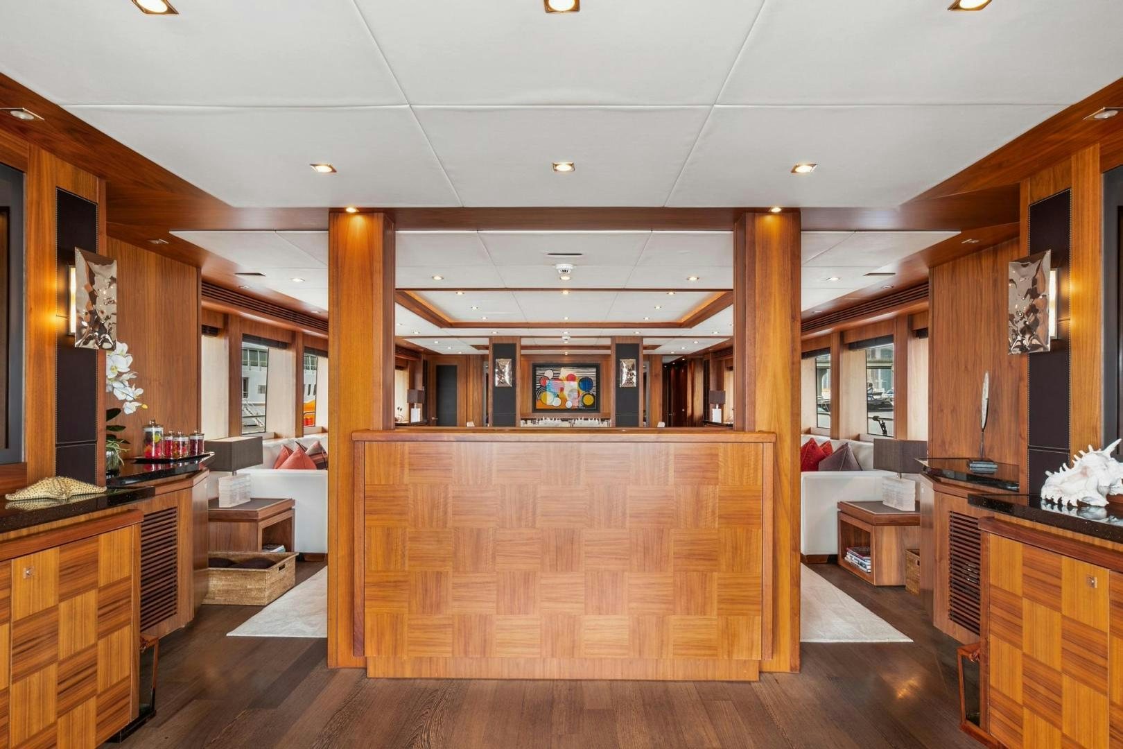 a room with wood furniture aboard ACACIA Yacht for Sale