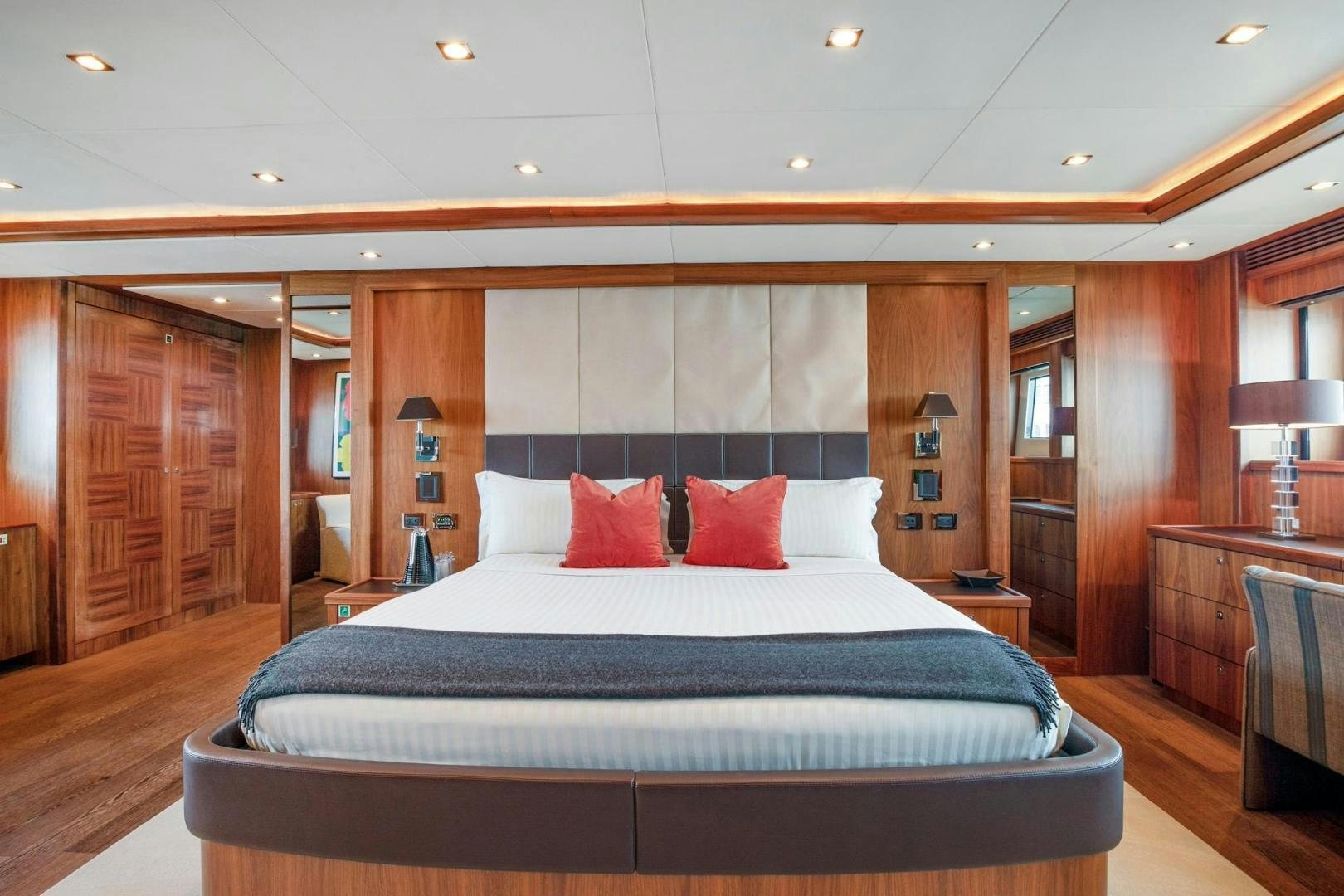 a large bed in a hotel room aboard ACACIA Yacht for Sale