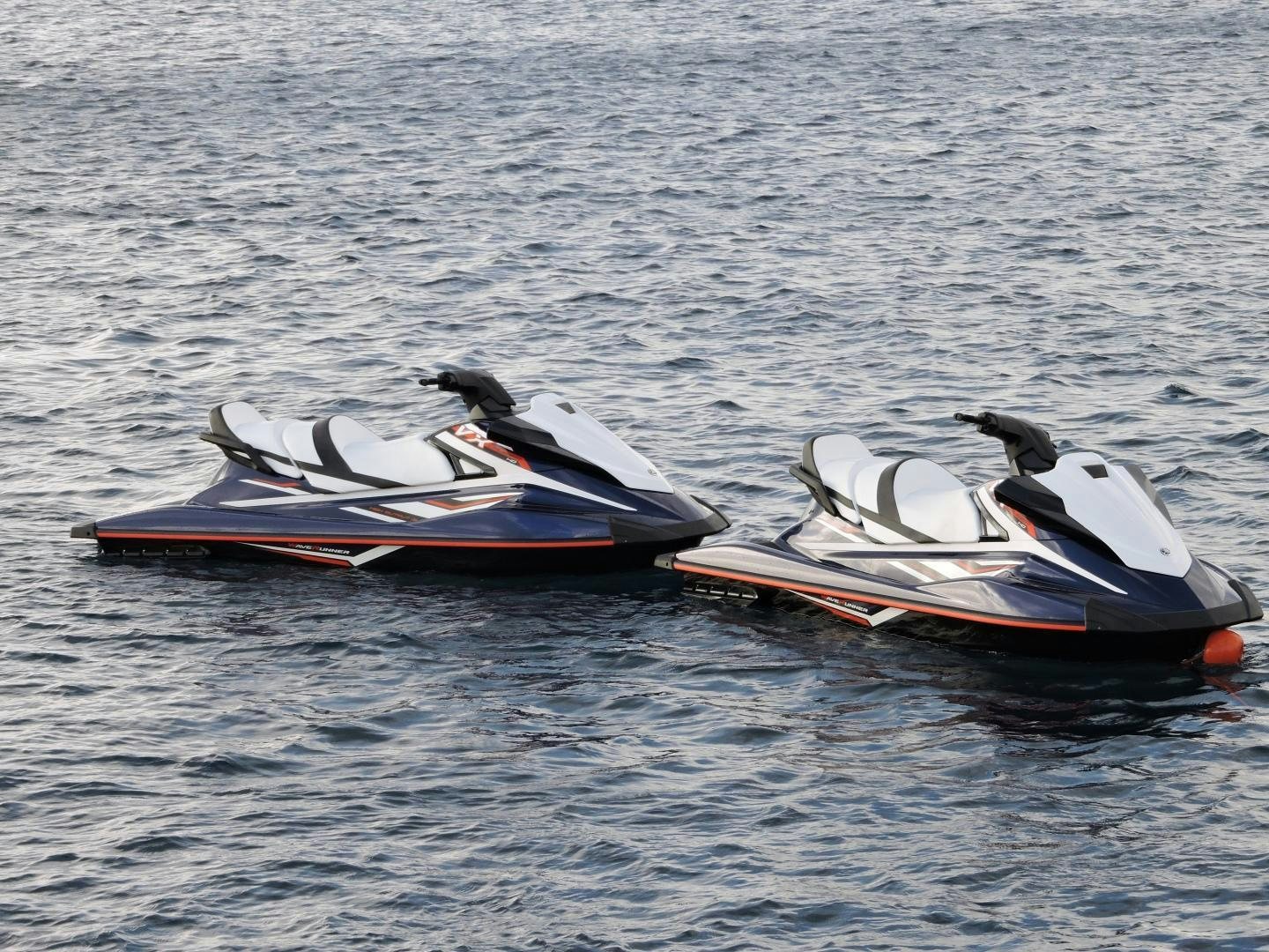 two go-karts on a wet surface aboard ACACIA Yacht for Sale