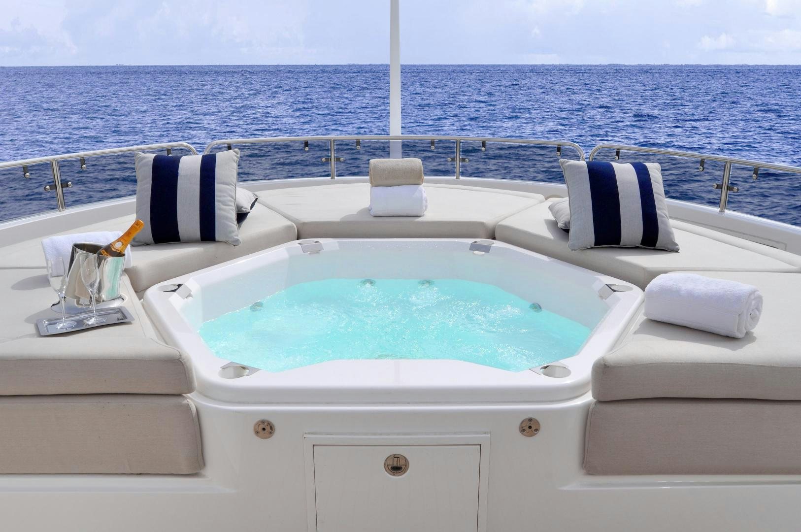 a bathtub with a towel on it by the ocean aboard ACACIA Yacht for Sale