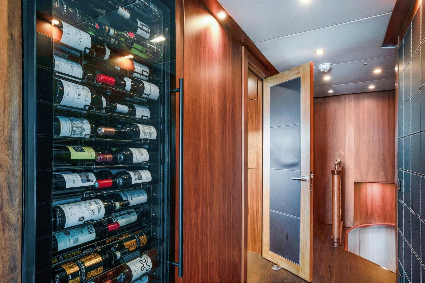 a room with shelves and a door aboard ACACIA Yacht for Sale