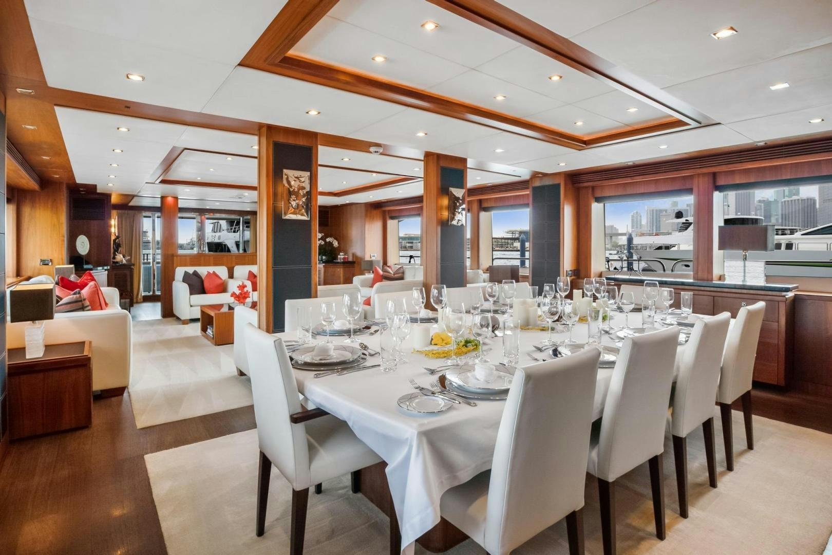 a large dining room with tables and chairs aboard ACACIA Yacht for Sale