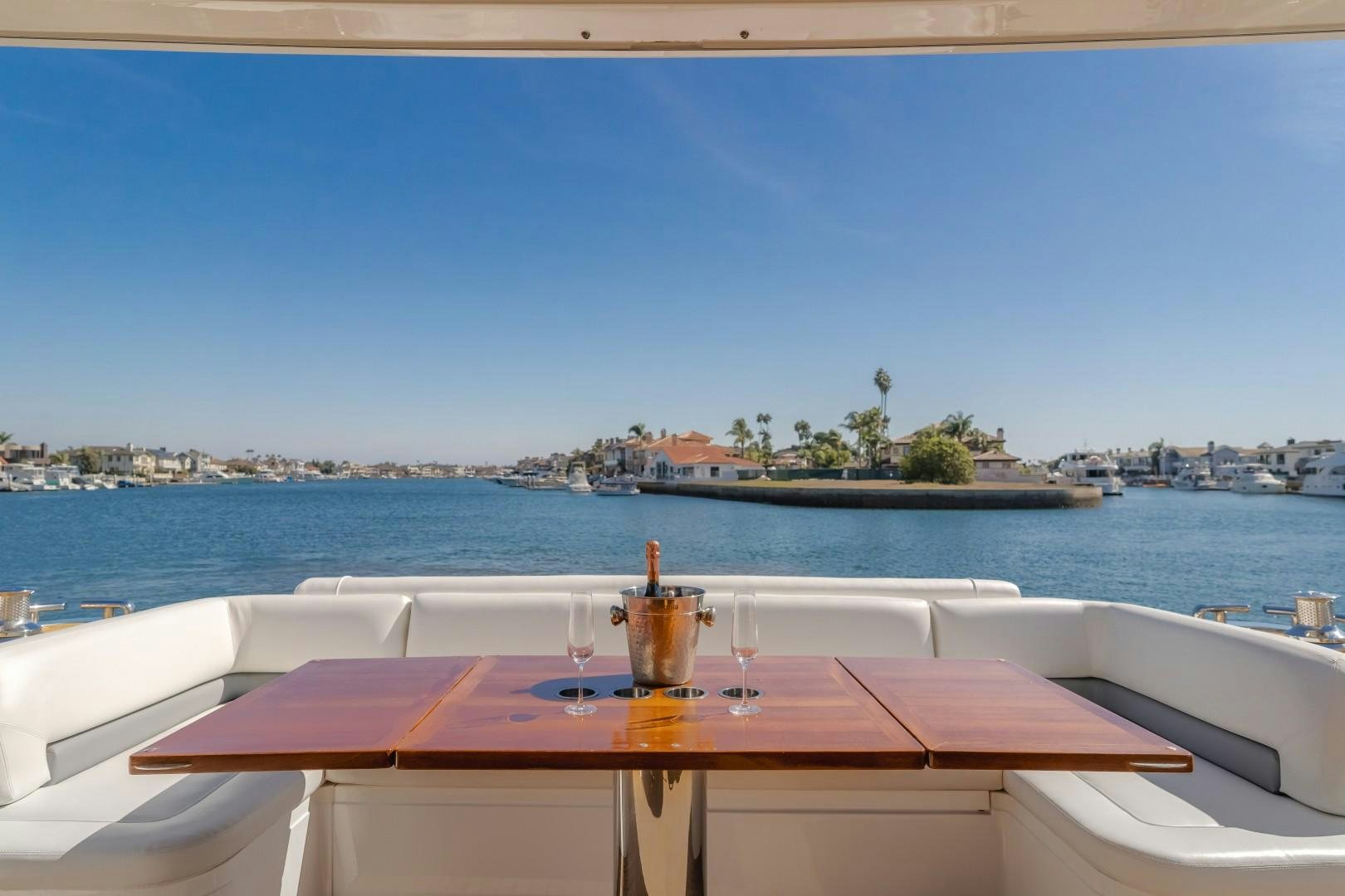 a glass of wine on a boat aboard KOINONIA Yacht for Sale