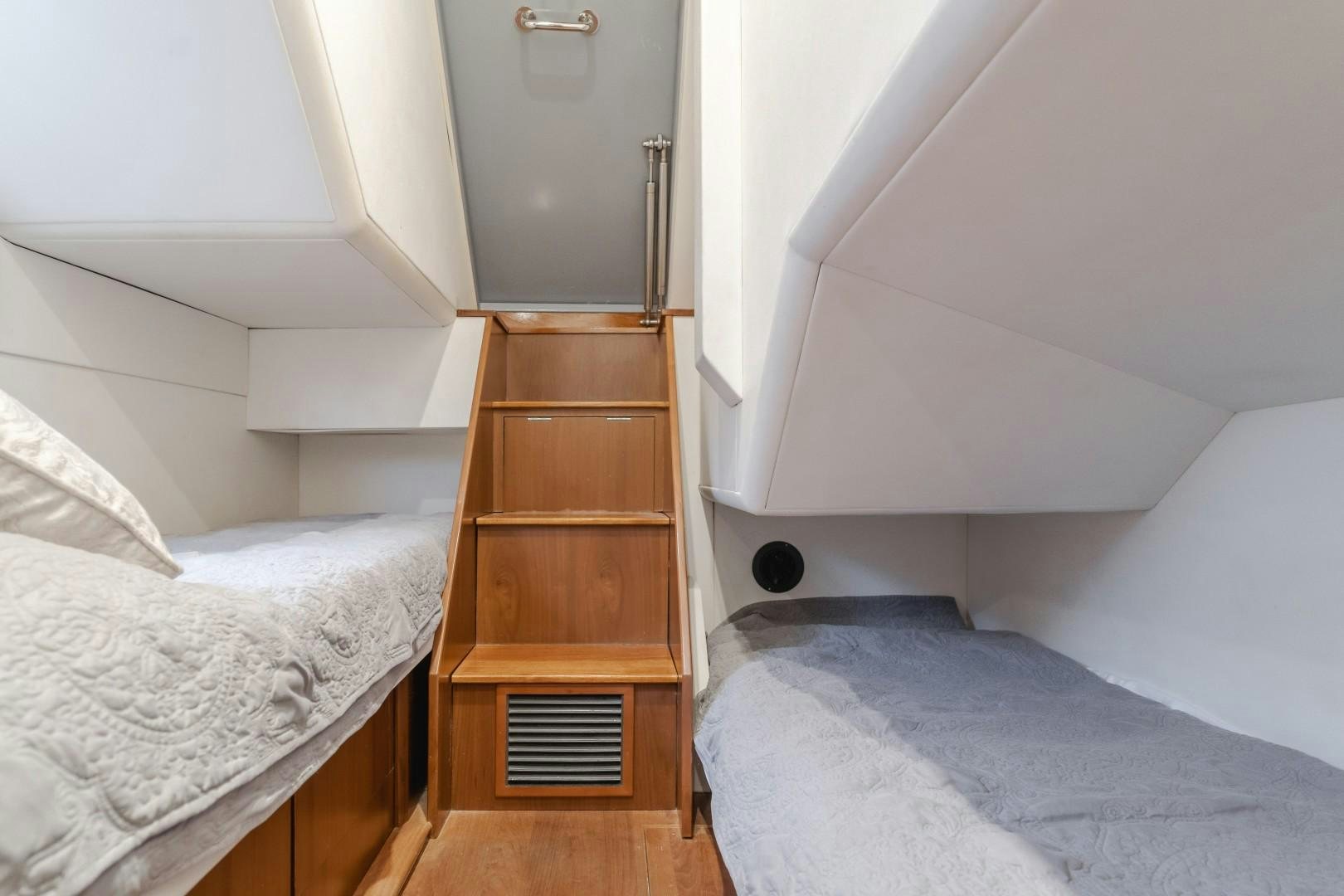 a wooden cabinet in a room aboard KOINONIA Yacht for Sale