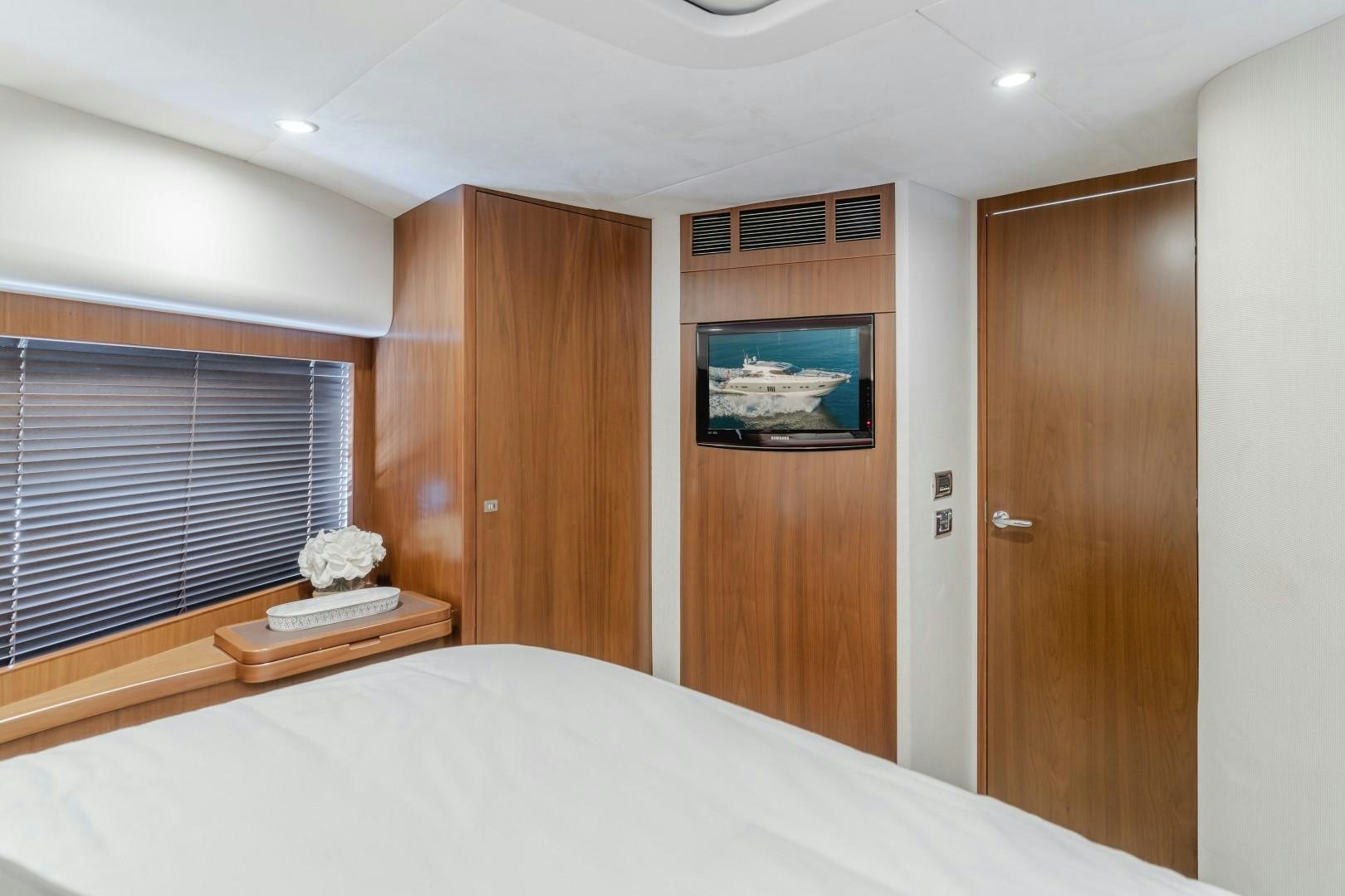 a bed in a room aboard KOINONIA Yacht for Sale