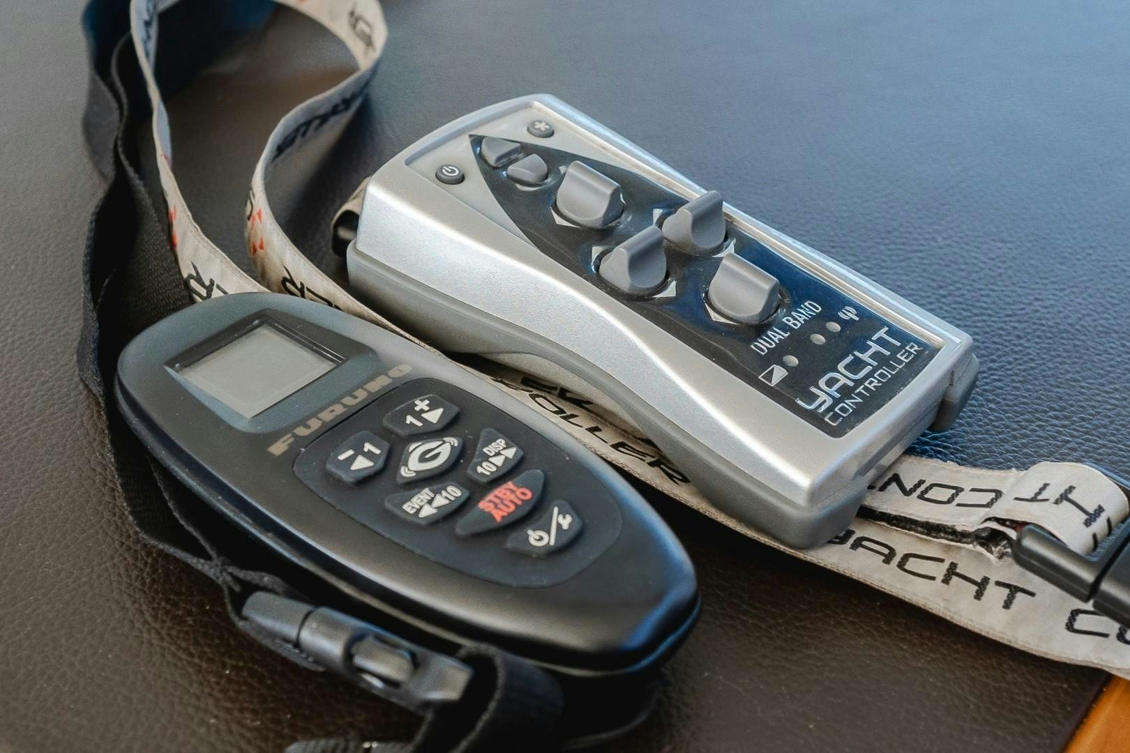 a couple of phones aboard KOINONIA Yacht for Sale