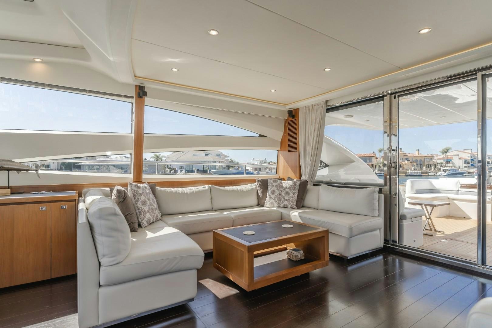 a living room with a couch and a table aboard KOINONIA Yacht for Sale