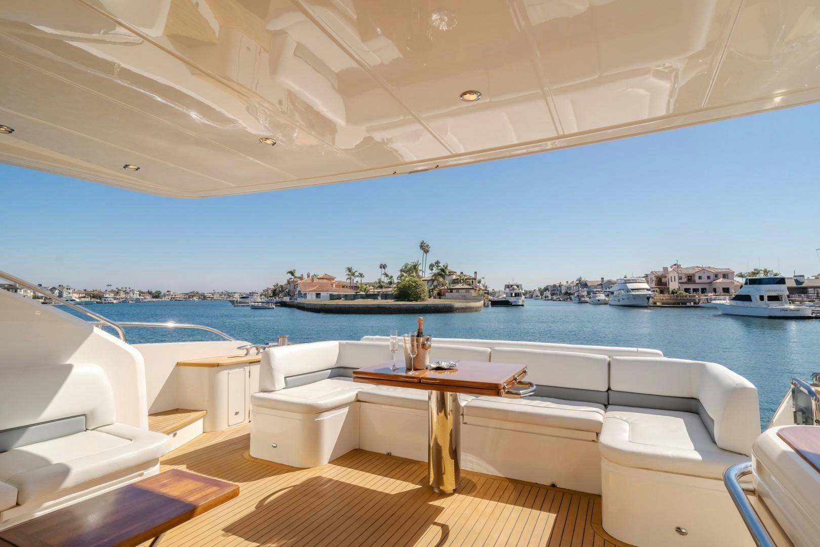 a room with a table and chairs aboard KOINONIA Yacht for Sale