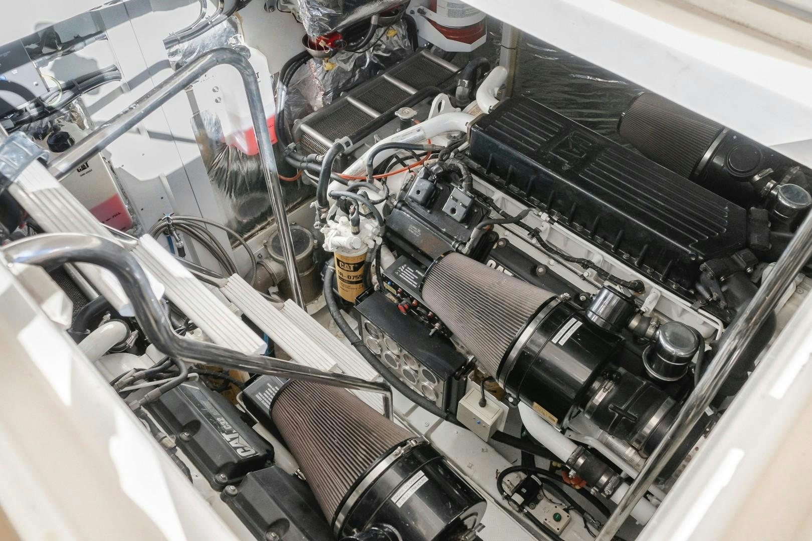 a car engine with a yellow cap aboard KOINONIA Yacht for Sale