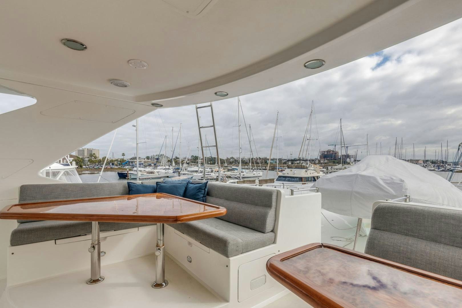 a table and chairs on a boat aboard LADY GIGI Yacht for Sale