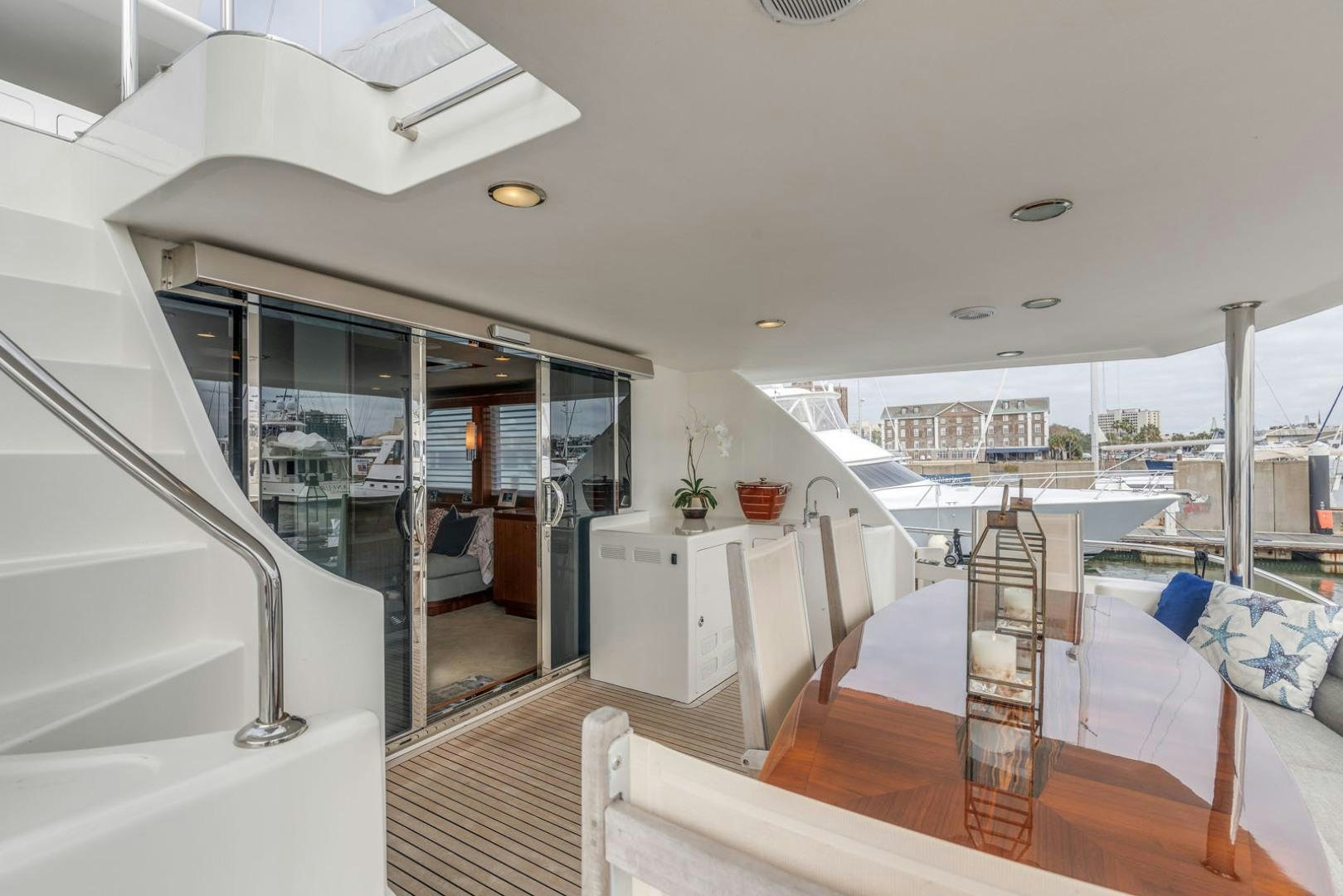 a large open house with a view of the city aboard LADY GIGI Yacht for Sale