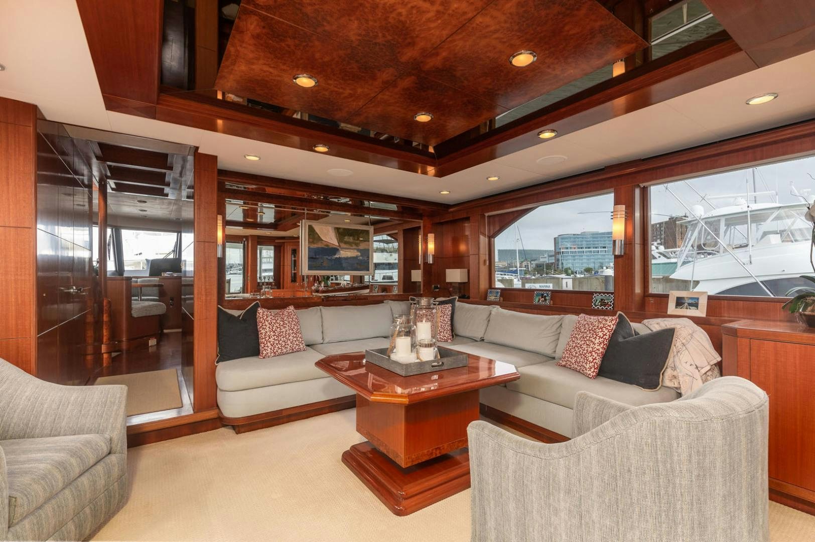 a living room with a large window aboard LADY GIGI Yacht for Sale