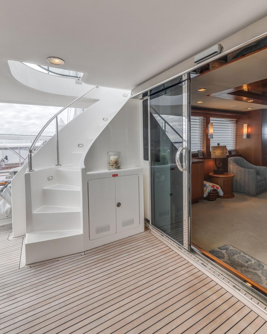 a large white staircase in a house aboard LADY GIGI Yacht for Sale