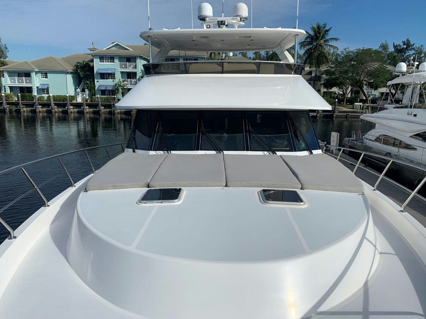 a yacht in a harbor aboard LADY GIGI Yacht for Sale